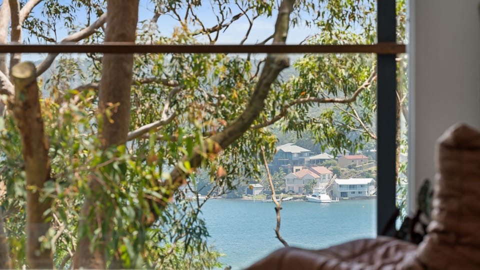 Experience stunning lake views from the comfort of your own home—every room is framed by the beauty of nature just outside your window.