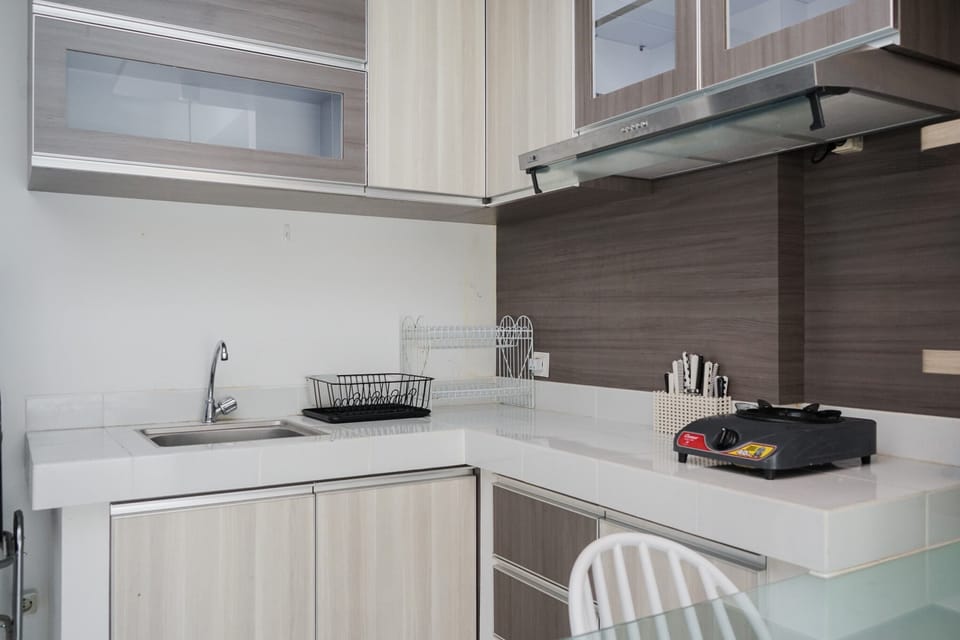 Apartment | Private kitchen | Full-size fridge, stovetop, rice cooker, dining tables