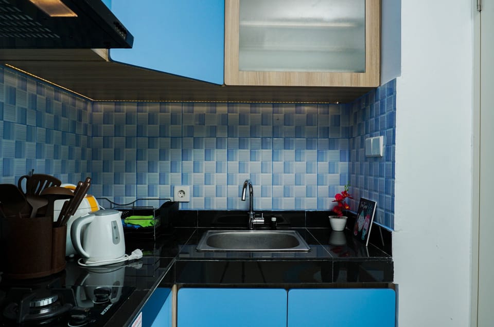 Apartment | Private kitchen | Full-size fridge, microwave, stovetop, rice cooker