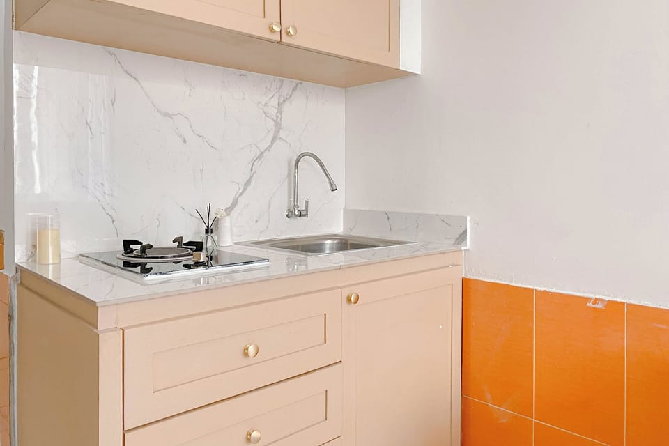 Apartment | Private kitchen | Full-size fridge, stovetop, rice cooker, dining tables