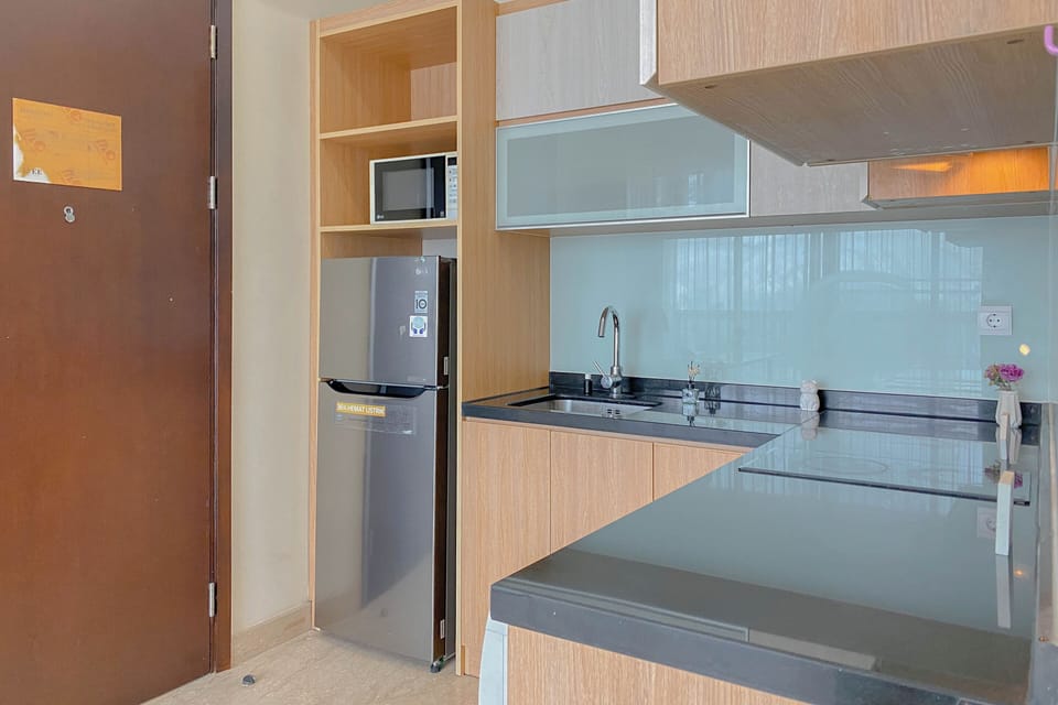 Apartment | Private kitchen | Full-size fridge, microwave, stovetop, rice cooker