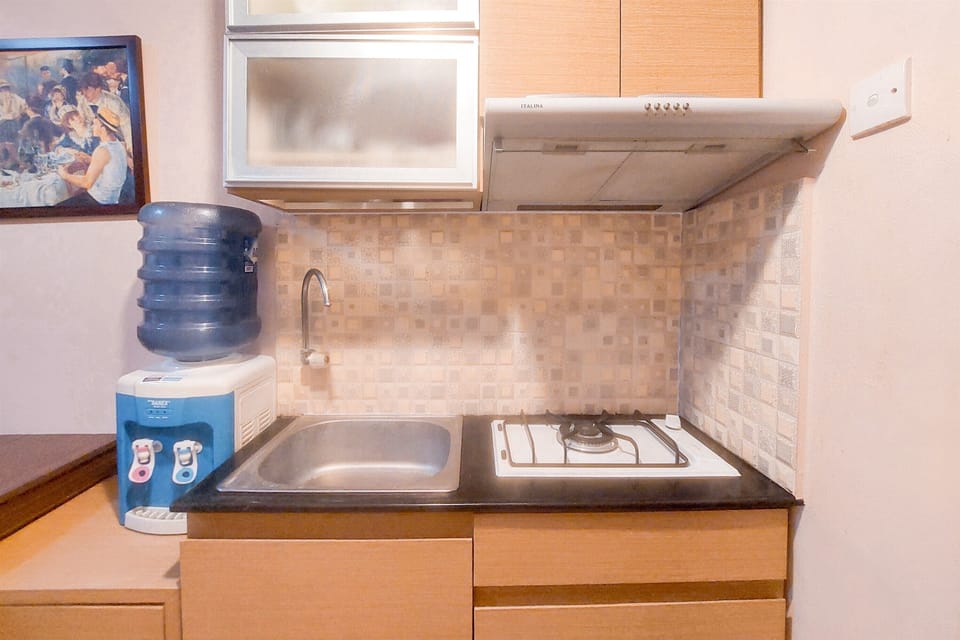 Apartment | Private kitchen | Full-size fridge, stovetop, rice cooker, dining tables