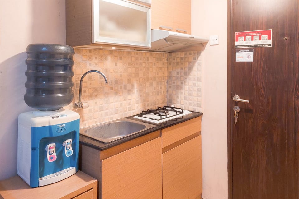 Apartment | Private kitchen | Full-size fridge, stovetop, rice cooker, dining tables