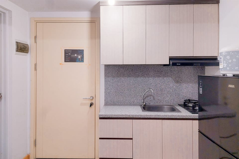 Apartment | Private kitchen | Full-size fridge, stovetop, rice cooker, dining tables