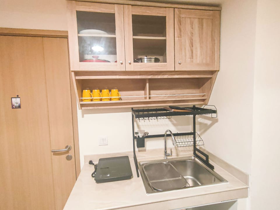 Apartment | Private kitchen | Full-size fridge, microwave, stovetop, rice cooker