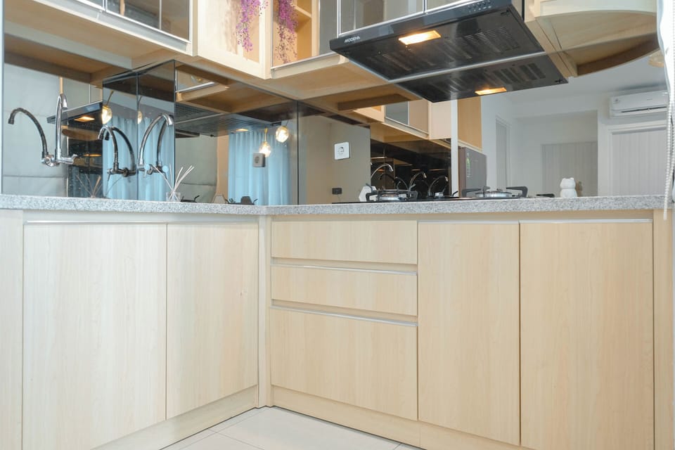 Apartment | Private kitchen | Full-size fridge, stovetop, rice cooker, dining tables