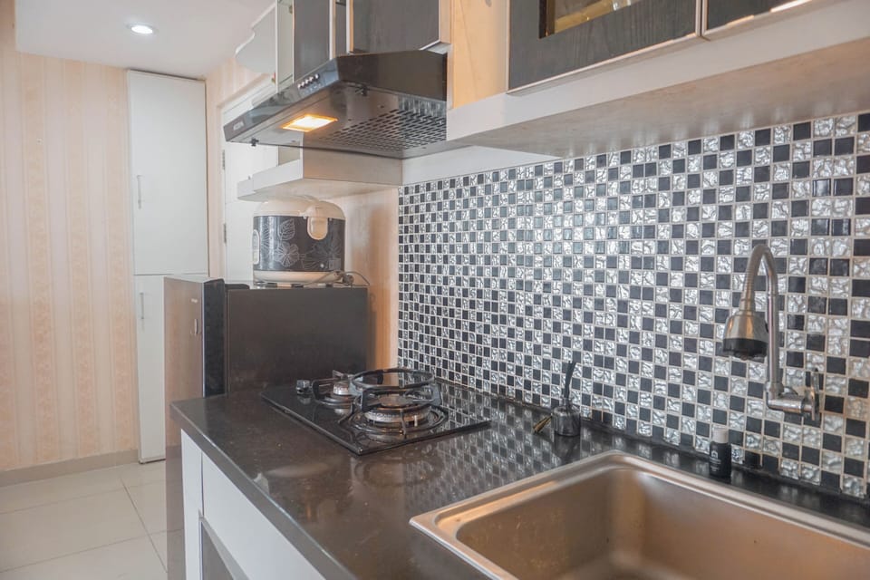 Apartment | Private kitchen | Full-size fridge, stovetop, rice cooker, dining tables