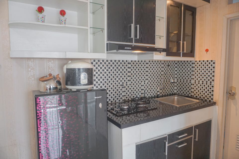 Apartment | Private kitchen | Full-size fridge, stovetop, rice cooker, dining tables