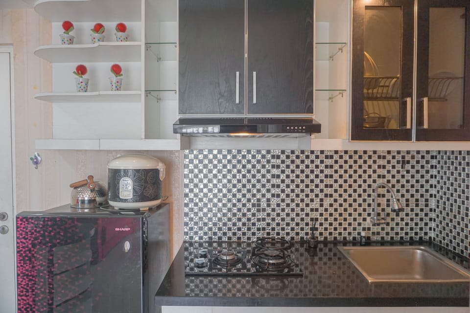 Apartment | Private kitchen | Full-size fridge, stovetop, rice cooker, dining tables