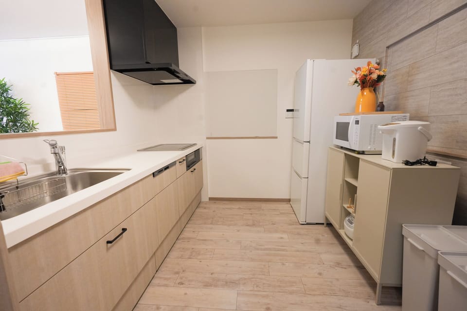 Comfort Villa | Private kitchen | Fridge, microwave, stovetop, electric kettle