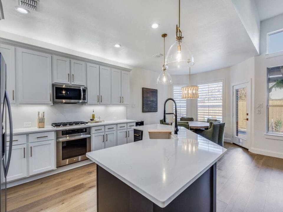 Enjoy natural light pouring in, with a view of the pool and backyard