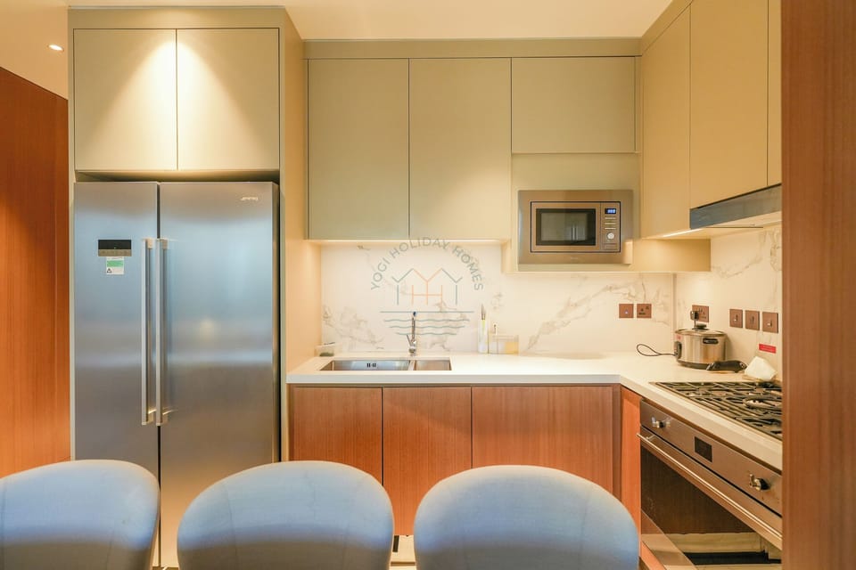 Deluxe Apartment, Kitchenette, City View | Private kitchen | Cleaning supplies