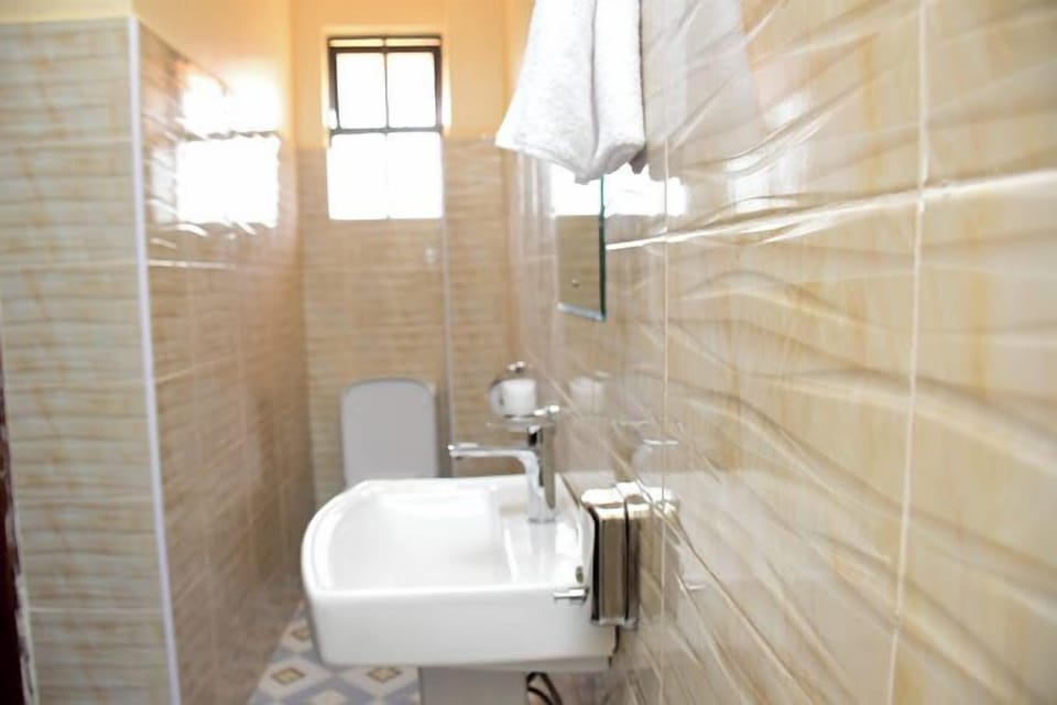 Shower, rainfall showerhead, designer toiletries, slippers
