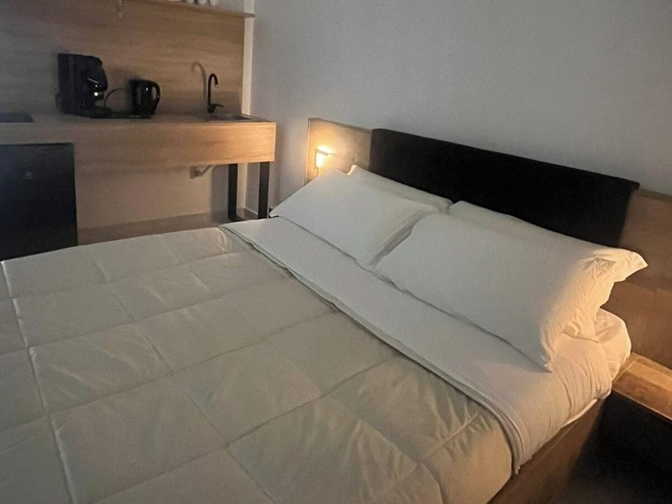 Family Room, Balcony, City View | Desk, free WiFi