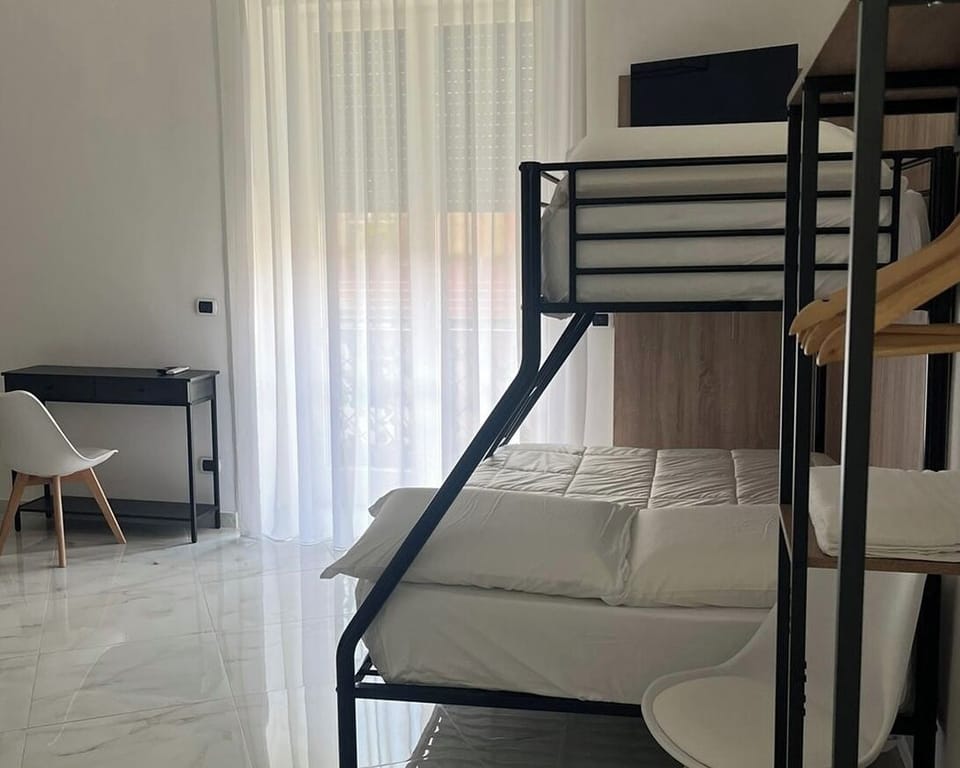 Family Room, Balcony, City View | Desk, free WiFi