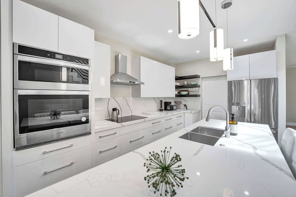Feel right at home in this bright and welcoming chef’s kitchen, fully equipped with modern appliances and everything you need to cook, gather, and enjoy.