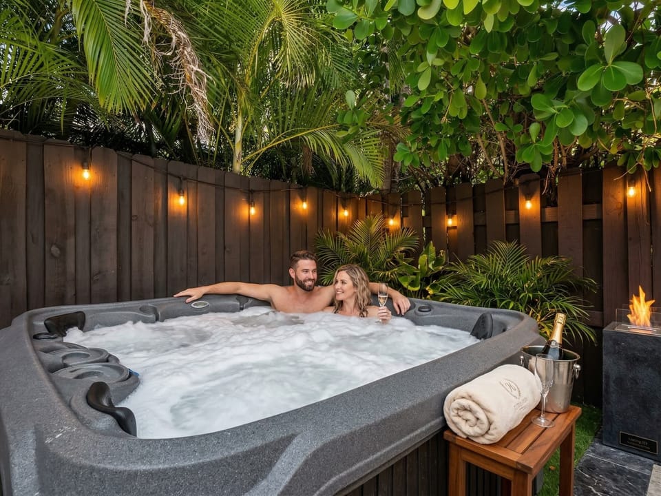 Unwind in your private retreat with sparkling lights and lush greenery!