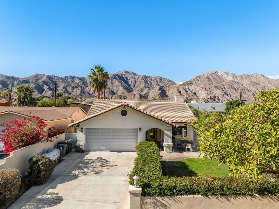 2-car garage and plenty of parking space in the driveway. Corner lot. Gorgeous views of the mountains and grass front yard you and your pets with enjoy