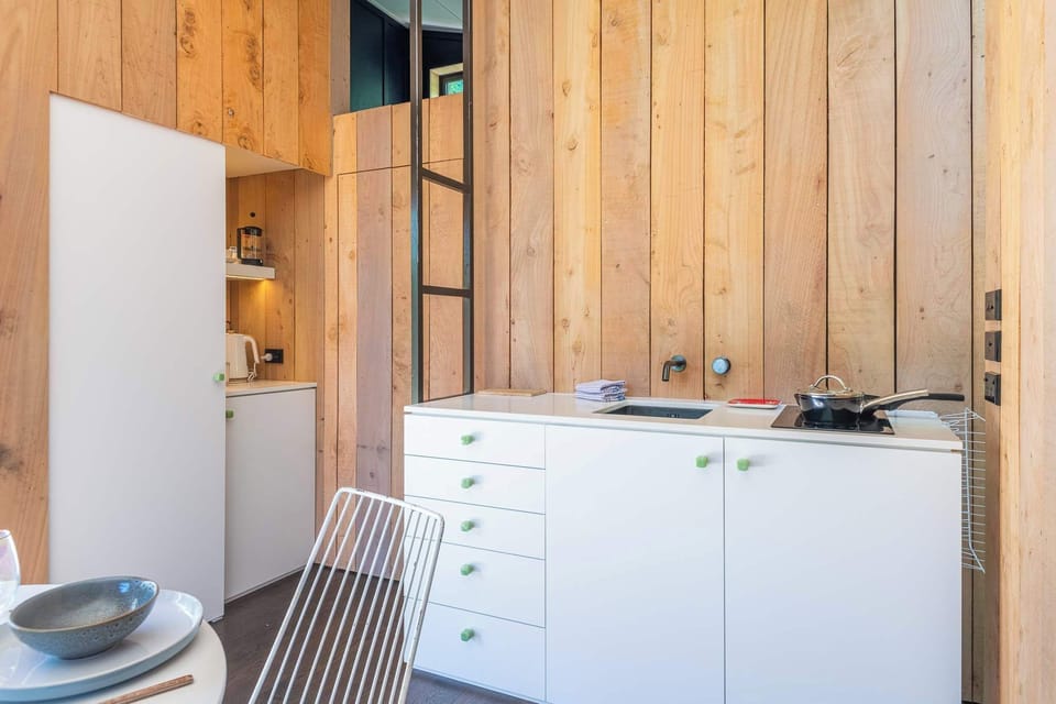 Compact kitchen with full appliances