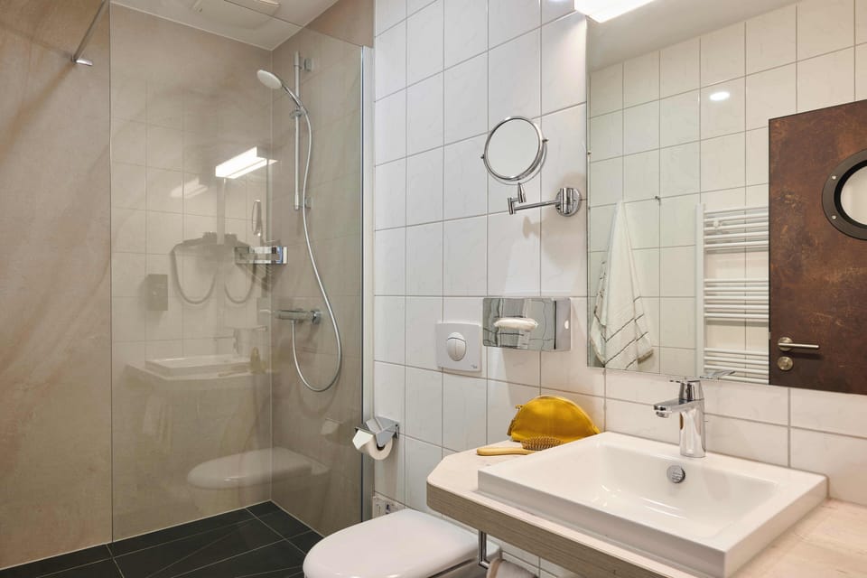 Double Room | Bathroom | Shower, hair dryer, towels, soap