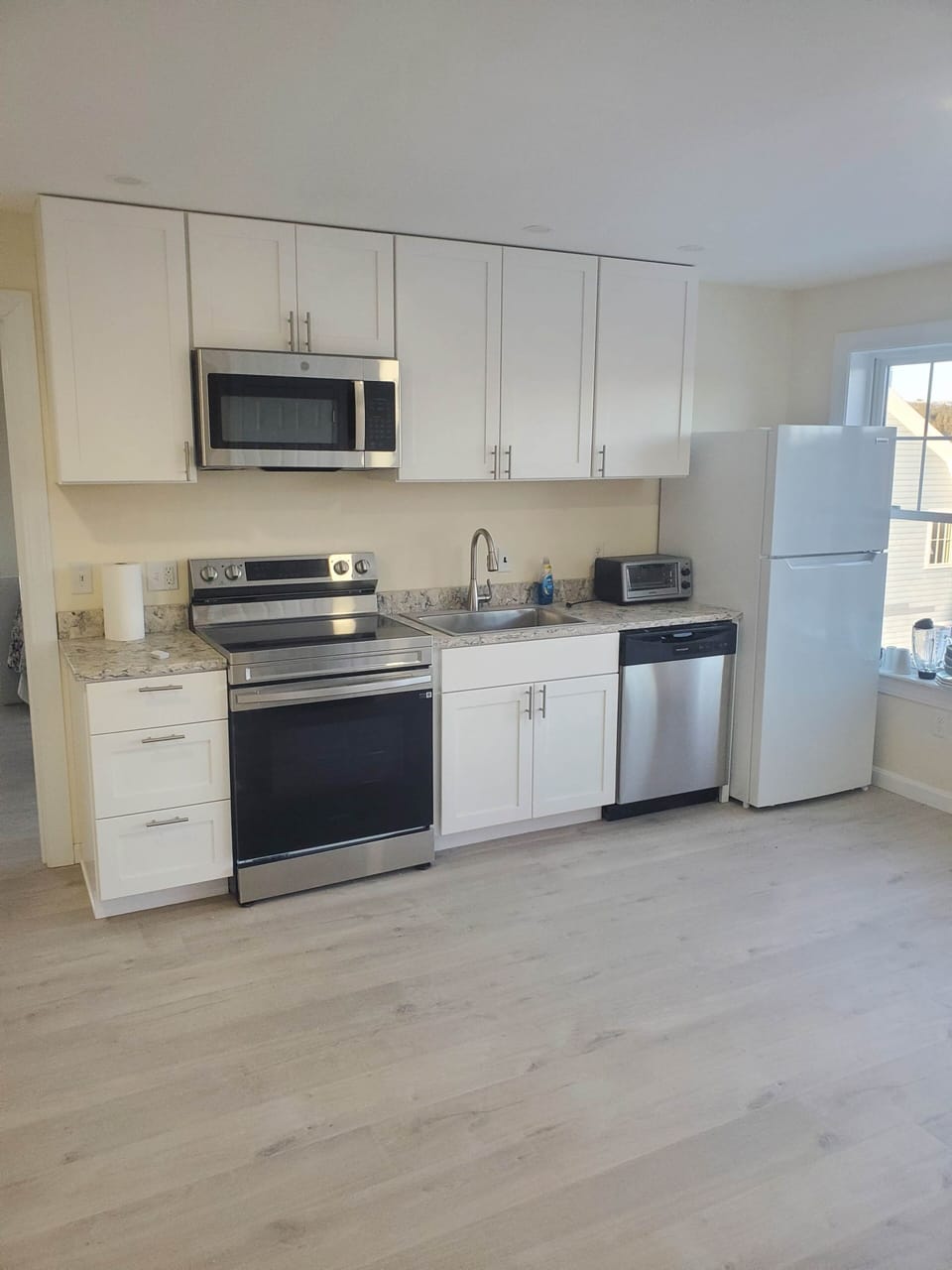 Newly remodeled kitchen, with 2nd bedroom just beyond
