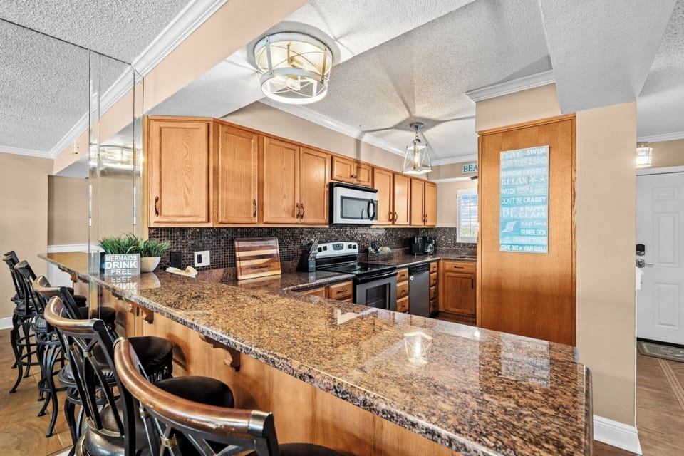 Large kitchen with bar seating