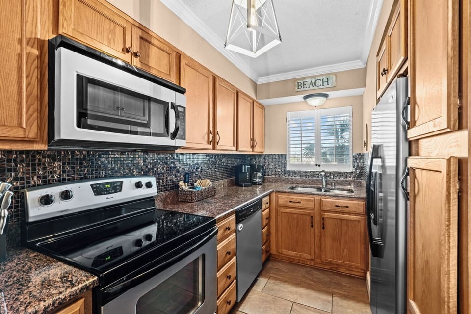 Kitchen has all appliances needed for your stay