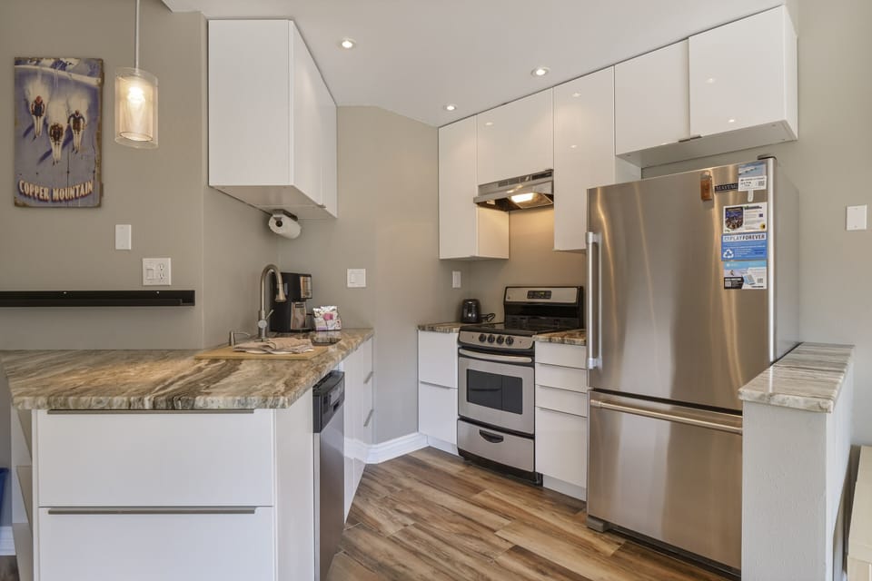 Indoors, Kitchen, Refrigerator, Lamp, Cooktop