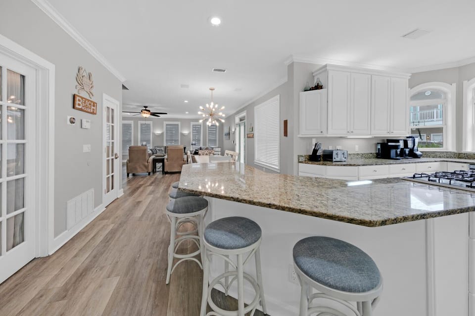 Kitchen bar overlooking the dining and living areas