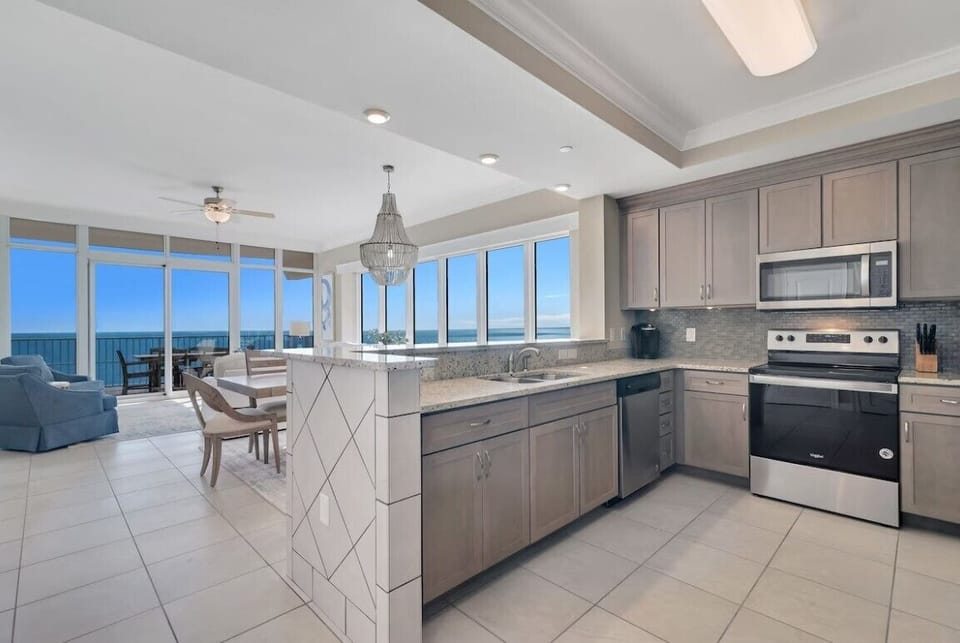 Fully equipped, open concept kitchen with seating for 18 (including balcony)