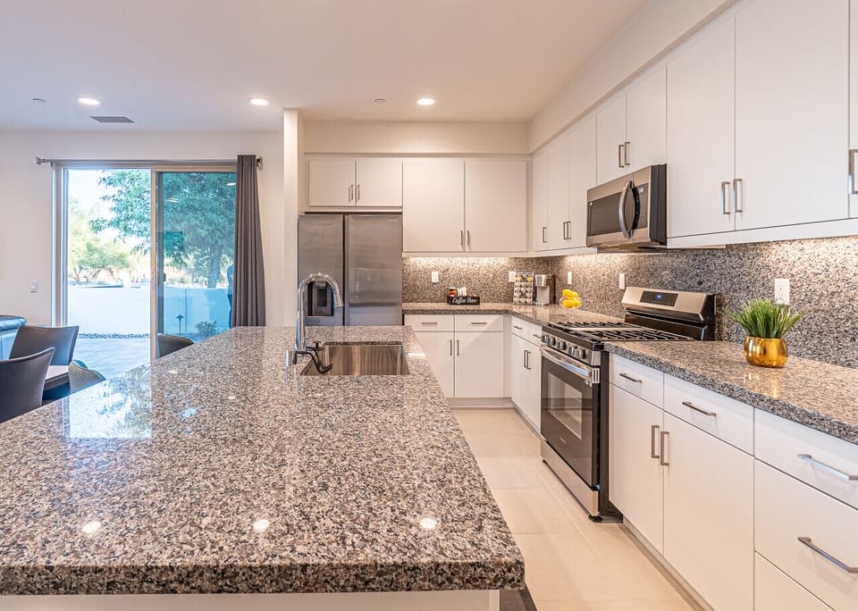 Fully stocked kitchen with high end finishes through out!