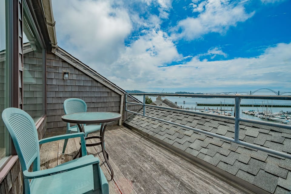 Step out onto the private balcony, where panoramic views of the sky and sea invite you to relax and unwind.