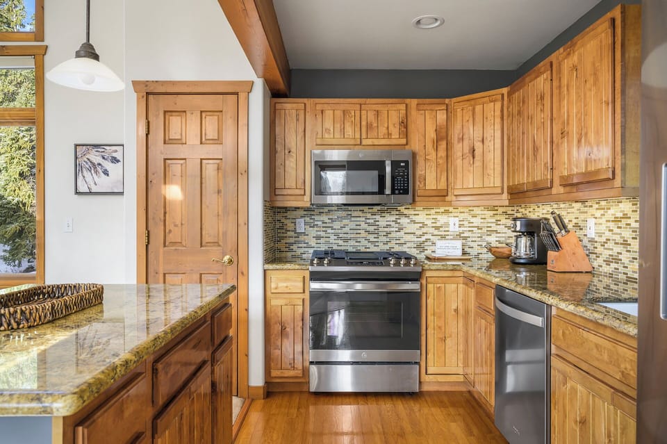 Fully equipped kitchen with stainless steel appliances