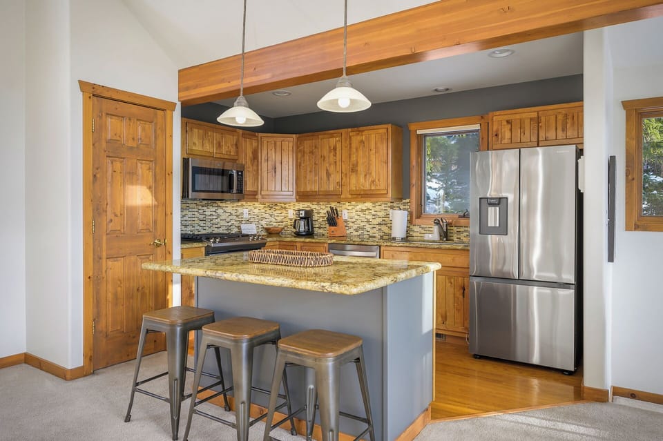 Seating for three at the breakfast bar