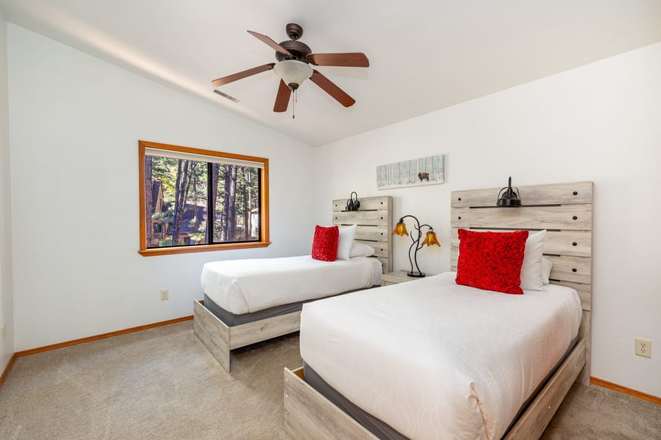 Bedroom 3: Two twin beds — perfect for kids or friends.