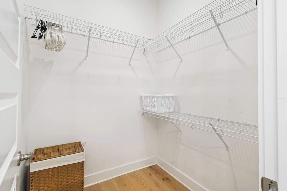Bedroom features a large walk-in closet.