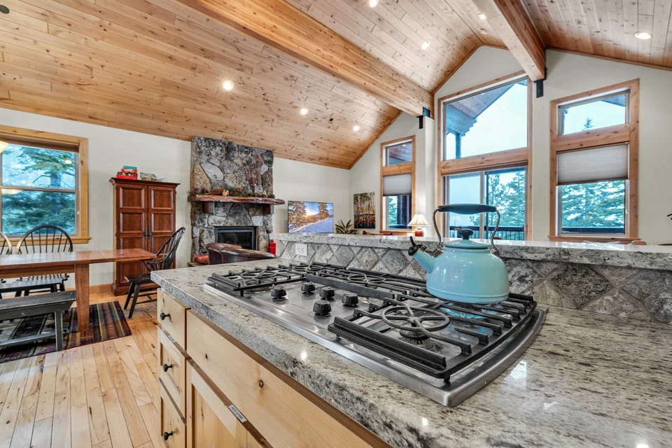 Kitchen: Main floor, drip coffee maker, Keurig, toaster, cooking utensils, tableware

