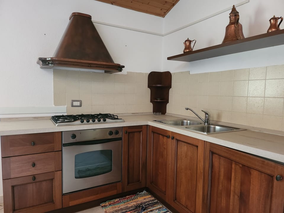 Classic Apartment, Hill View | Private kitchen | Highchair