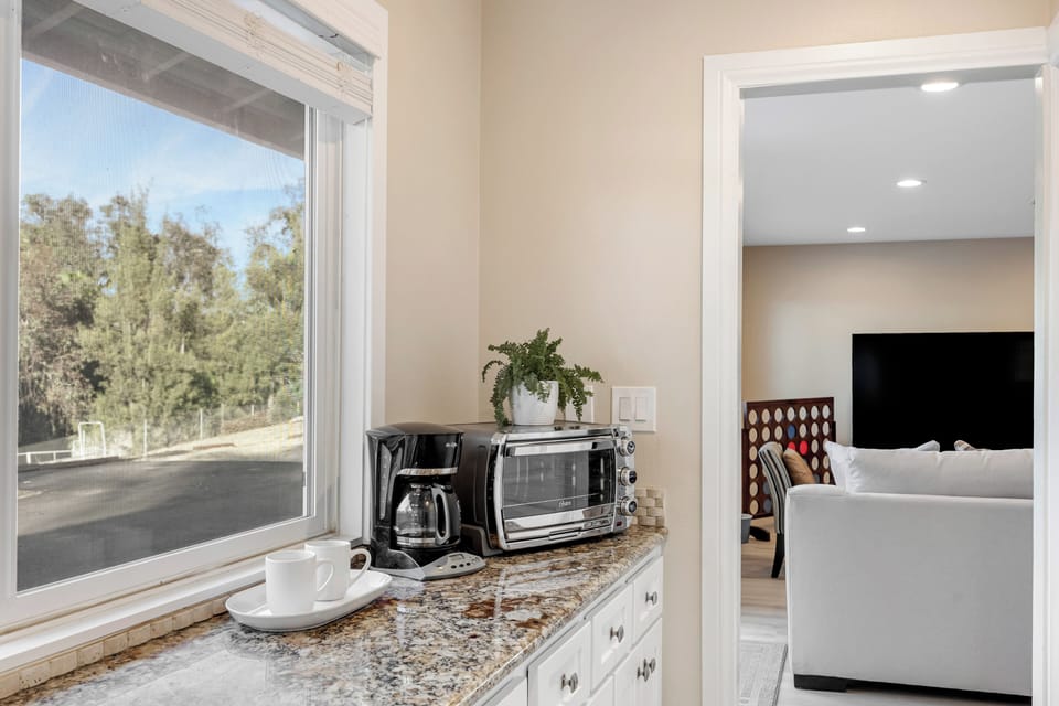 Coffee station and microwave.