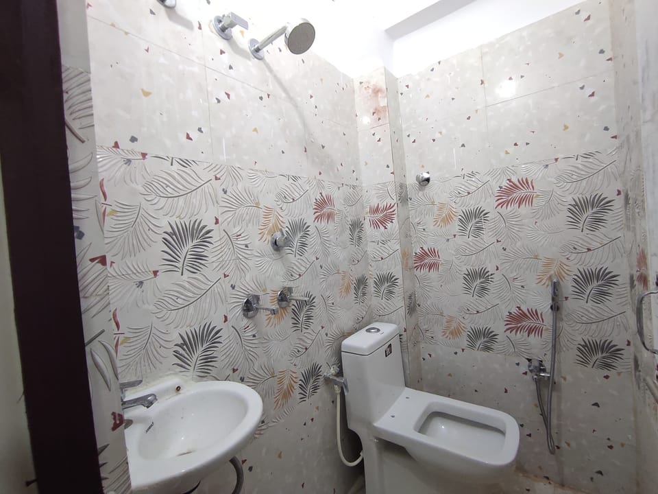 Shower, towels, soap, shampoo