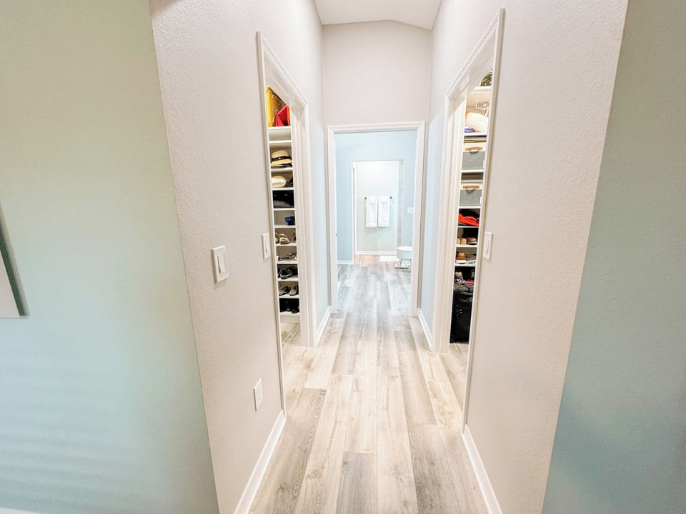 Large hallway to master bathroom