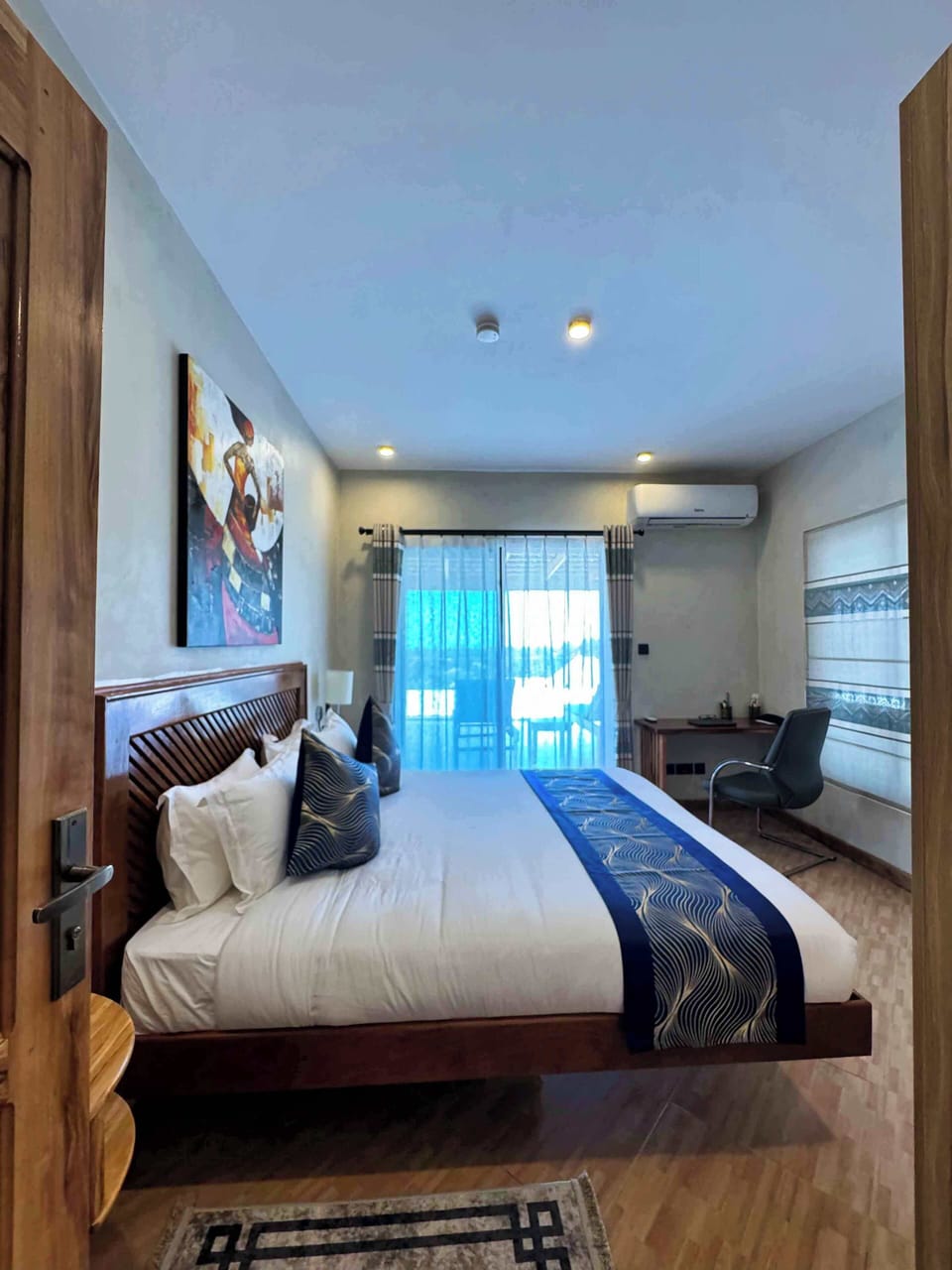 Family Apartment, Balcony, Mountain View | Minibar, desk, laptop workspace, iron/ironing board