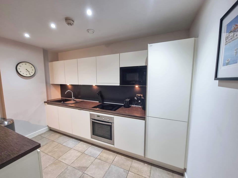 Whether you're a culinary enthusiast or simply need a quick snack, this kitchen has everything you need to feel right at home.