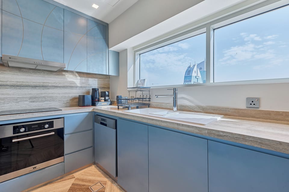 Luxury Apartment, City View | Private kitchen | Full-size fridge, microwave, oven, stovetop