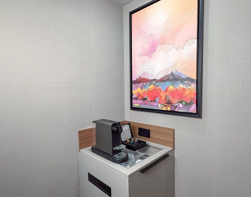 Grand Suite Jacuzzi and Balcony | Minibar, in-room safe, desk, laptop workspace
