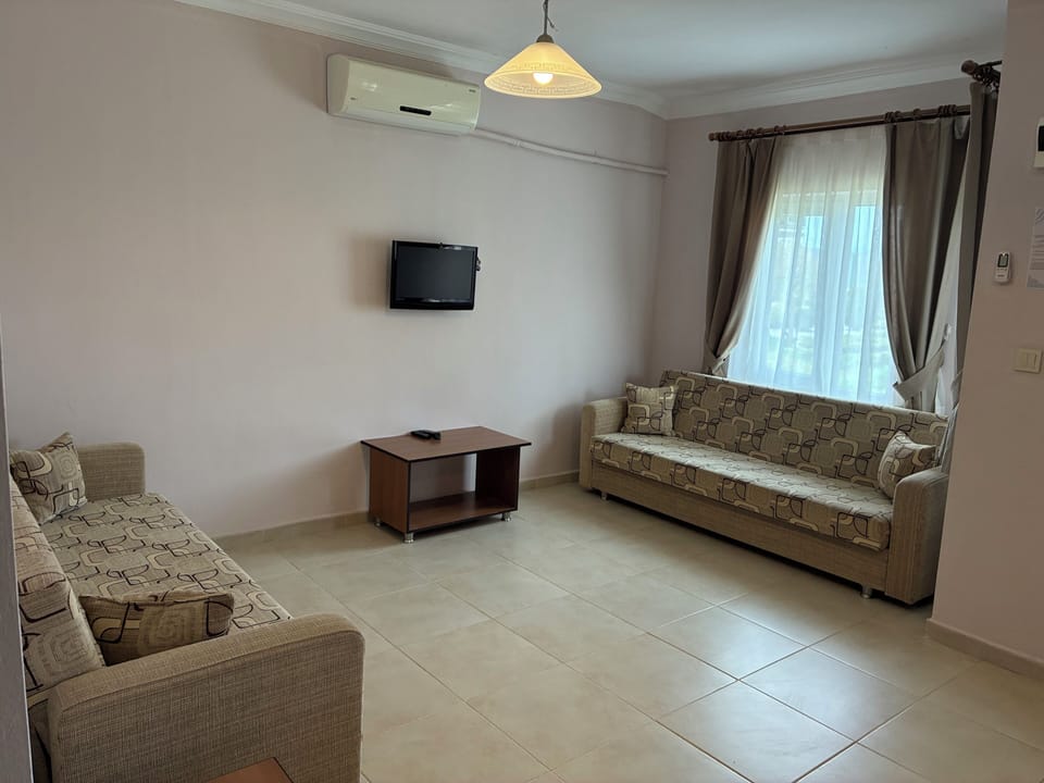 Family Apartment, Patio, Pool View | Free WiFi, bed sheets