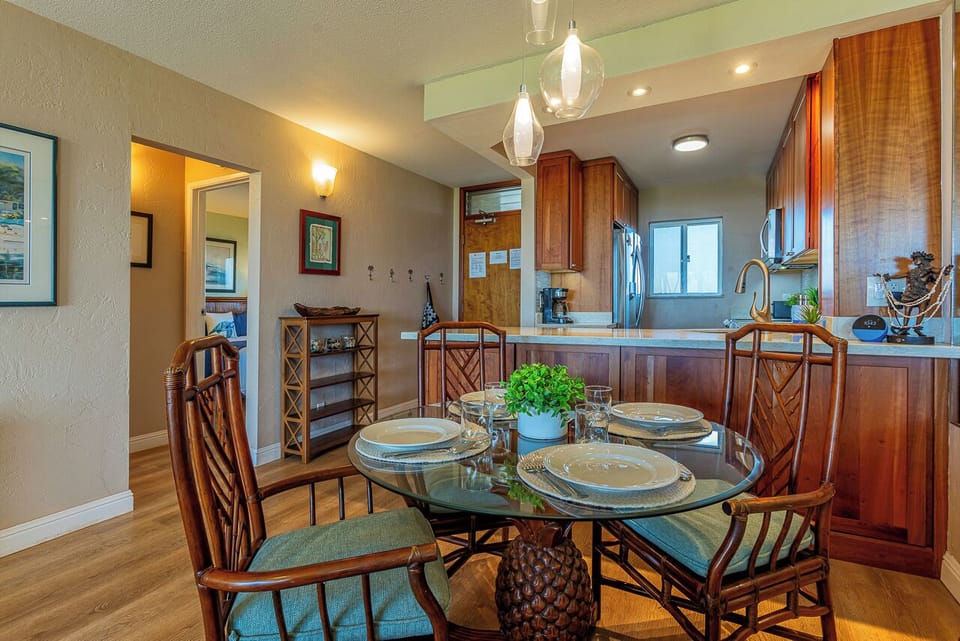 Entry way with dining and kitchen area