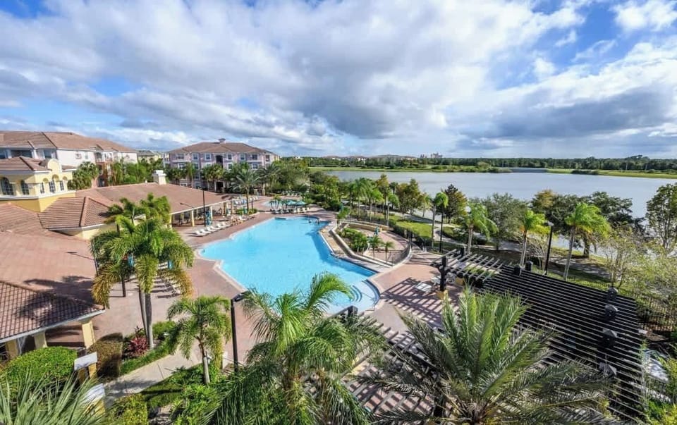 Relax in paradise! Enjoy resort-style amenities including a stunning pool, lush landscapes, and serene lake views. Perfect for unwinding after theme park adventures—your tranquil escape awaits just minutes from Orlando’s top attractions. Book now!