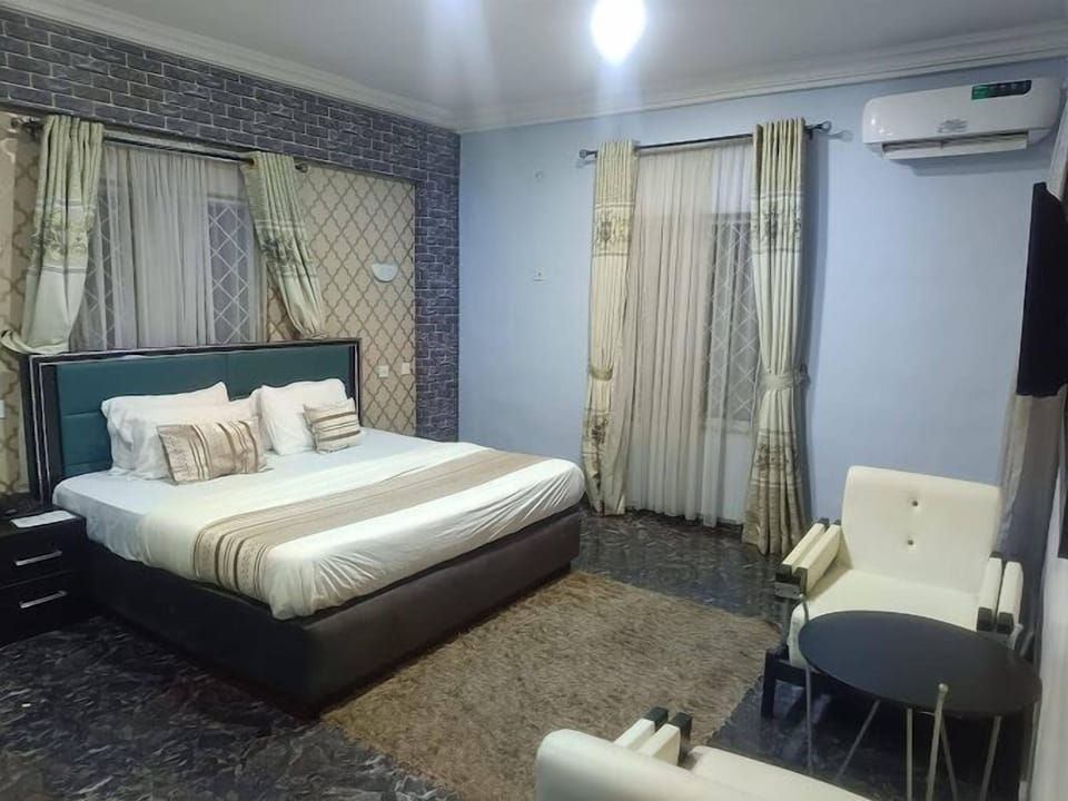 Family Room, Balcony, City View | Desk, laptop workspace, free WiFi