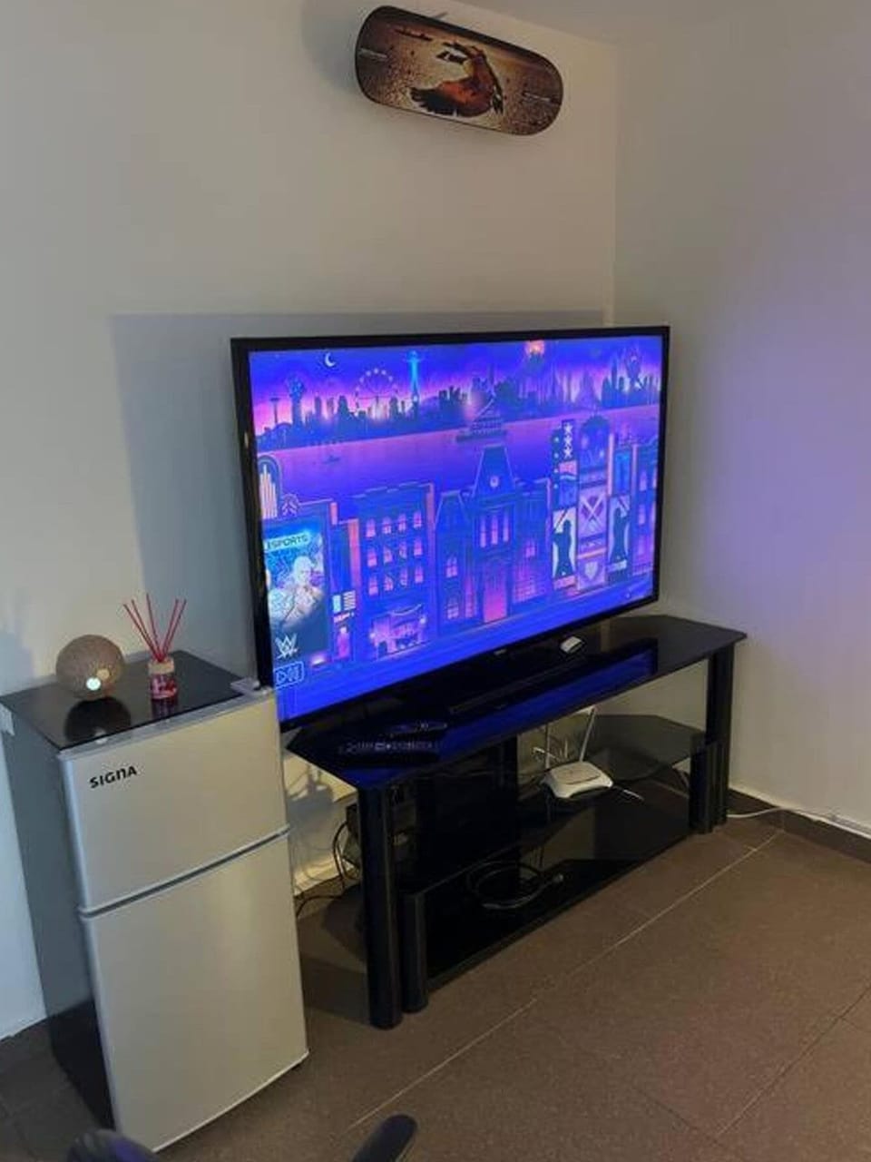 Standard Apartment | Living area | 65-inch Smart TV with digital channels, Netflix, first-run movies